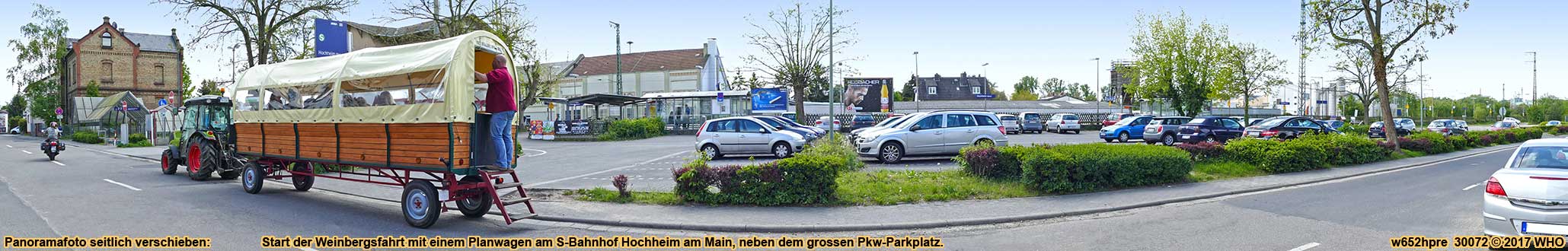 Start der Weinbergsfahrt mit einem Planwagen am S-Bahnhof Hochheim am Main, neben dem grossen Pkw-Parkplatz.